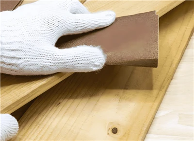 What preparations need to be made before using sandpaper?