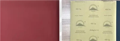 What are the structural differences between sandpaper and sandcloth?