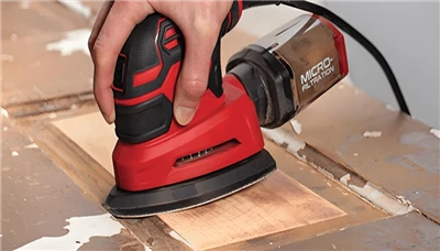 What safety precautions should be taken when using sandpaper in conjunction w...
