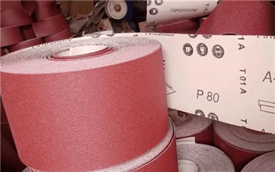 How is the wear resistance of sandpaper evaluated?
