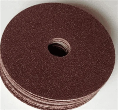 How do the material compositions of fiber grinding discs (such as resin fiber...