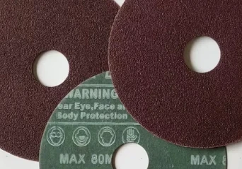 How does the height of the resin fiber grinding disc affect the pressure dist...